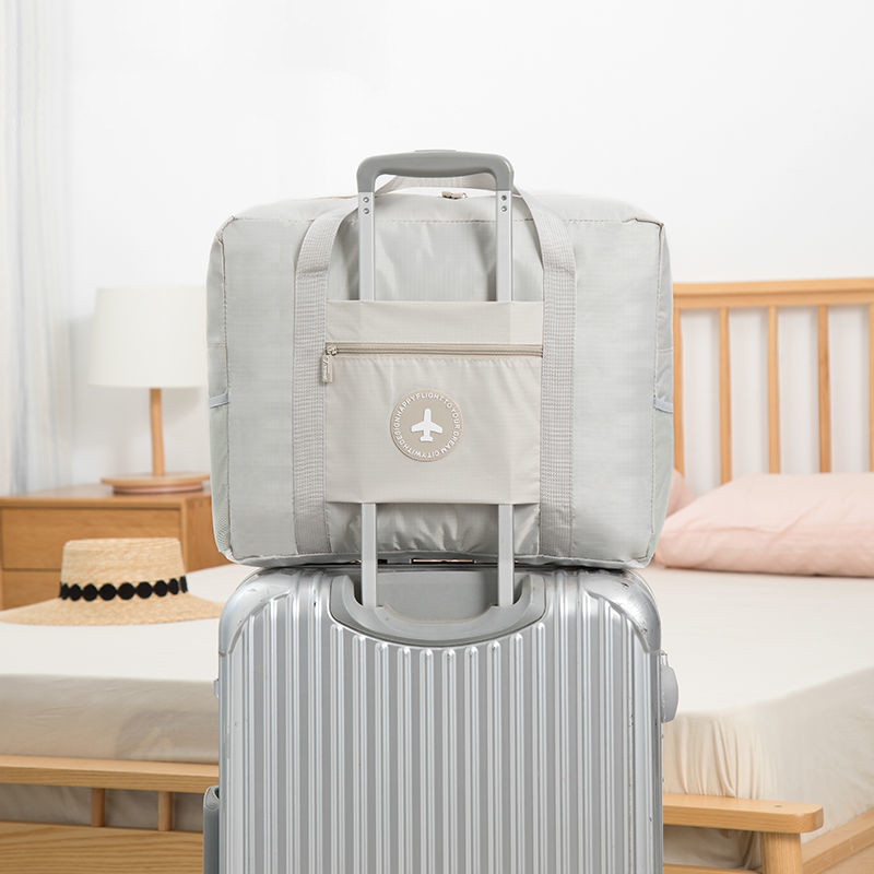 Travel bag Hand large capacity Short travel travel clothes cashier bag Waterproof Portable Light Luggage Bag-Taobao