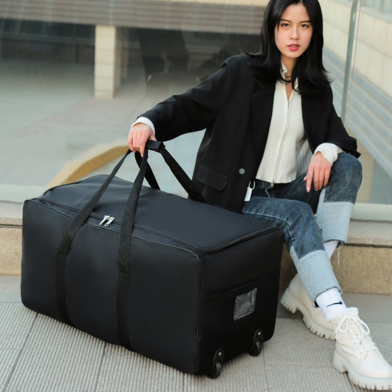 Travel bag large canvas luggage bag female college students loaded with quilt clothes large capacity men moving wheels