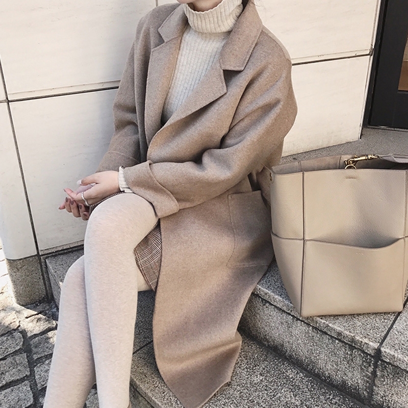 Áo chống mùa thu đông phiên bản Hàn Quốc của áo ngắn ngắn dài tay làm bằng tay áo hai dây Hepburn áo khoác len nữ áo khoác len nữ