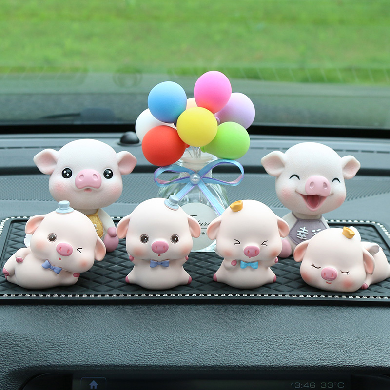 Automotive perfume fittings car shaking head dogji creative beautiful pig car decoration car decoration products large female