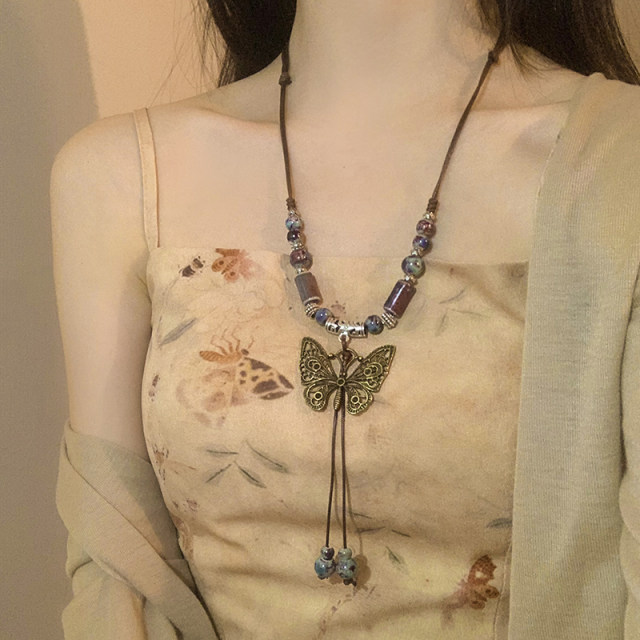 Retro Butterfly Beads ໃຫມ່ແບບຈີນແບບແຫ່ງຊາດ Necklace ສໍາລັບແມ່ຍິງ Zen ຊົນເຜົ່າ Stacked ຍາວ Horse Face Skirt ອຸປະກອນເສີມອະເນກປະສົງ