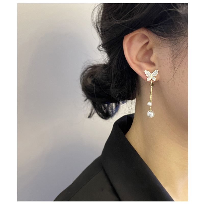 2021 new super-fairy Japan-ROK butterfly pearl mosquito incense tray ear clip without otolar-shaped female long version ear pendant fluttering