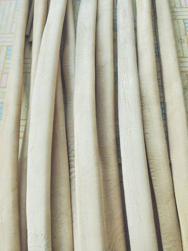 Inner Mongolia first-layer cowhide traditional crafts to make large rolled leather strips and mouth leather leading horse rope harness accessories