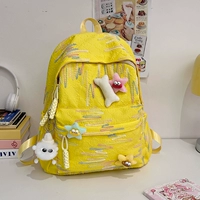 4 плюшевых значка на изображении желтого пояса