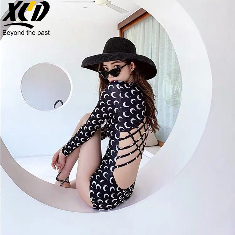 XCD new one-piece swimsuit woman 2020 covered with slim sexy dew back long sleeve triangular bikini Korean ins wind