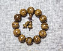 Gloomy golden nanmu hand string small leaf Zhennan Ebony head yellow material 2 0 Buddha beads full of gentian phoenix tail pattern collection