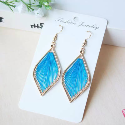 Hand-woven silk thread earrings with ethnic style in the Ancient Town Scenic area of Lijiang, Yunnan Province, are unique, simple and retro