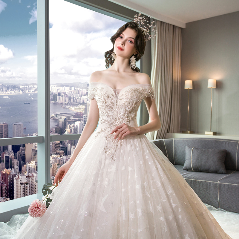 Light wedding dress 2020 new bride starry sky simple word shoulder luxury tail forest department super fairy dream luxury luxury