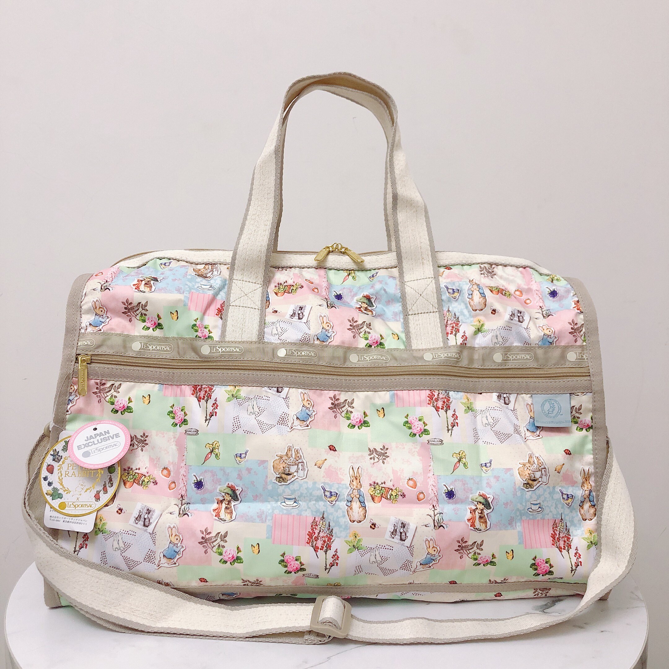 LeSportsac LeSportsac 7184 mid number and 7185 large number travel bag handbag with oblique satchel Peter Rabbit