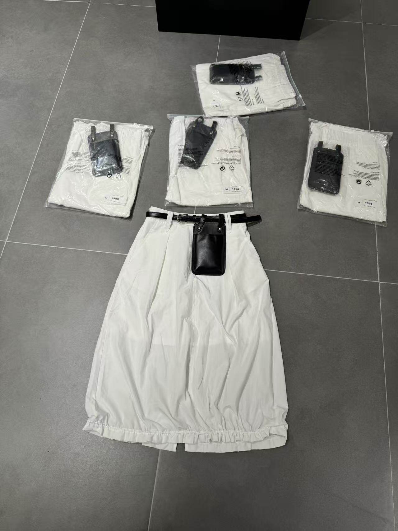 欧洲站2026夏季新款欧货时尚高腰显瘦宽松百搭开叉花苞半身裙女潮