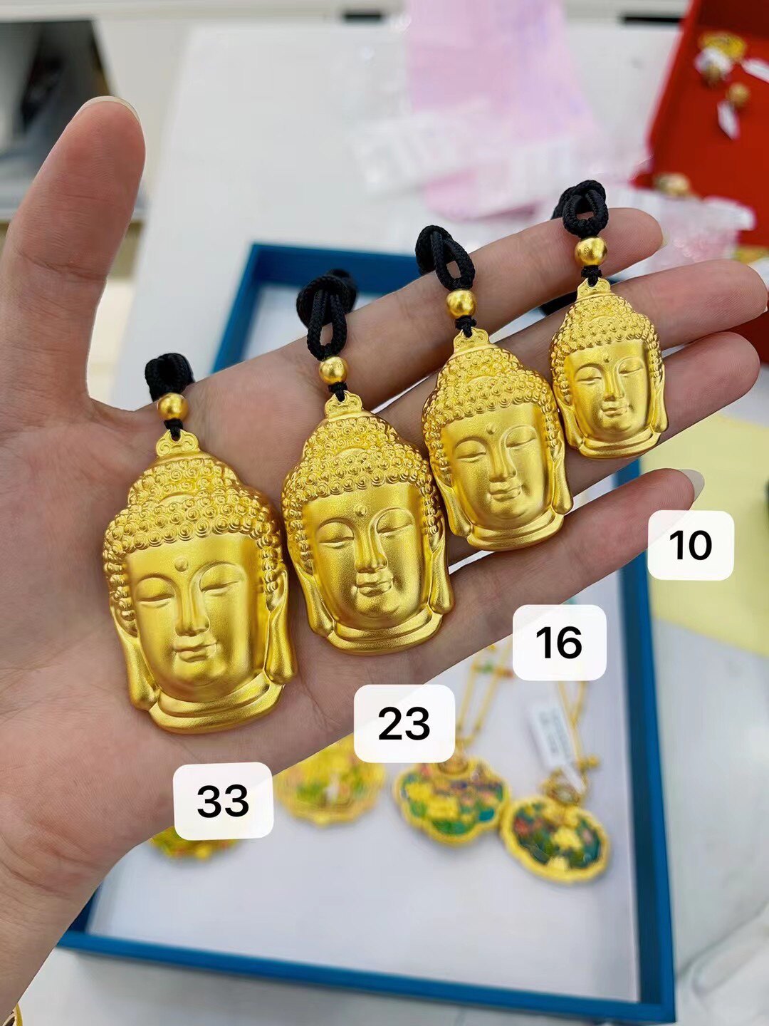 黄金佛头吊坠足金999古法传承挂件，按克计价购买有何优势？-计价黄金吊坠-淘宝好物网