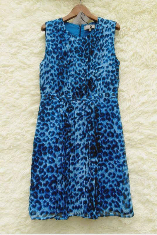 Special Offer: Leopard Print Dress with Gauze Outer Layer and Pure Cotton Lining, Featuring Attractive Design Details. Sizes S and m (I.E., m and L)