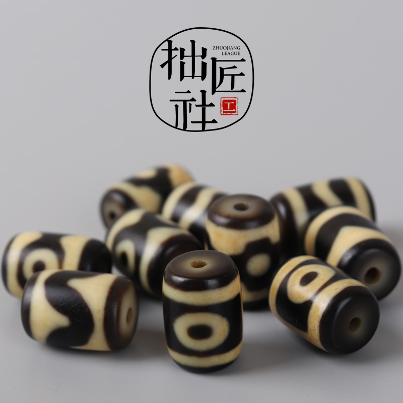 藏传西藏天珠中的两眼三眼虎牙水纹天珠有何区别？它们的价值如何