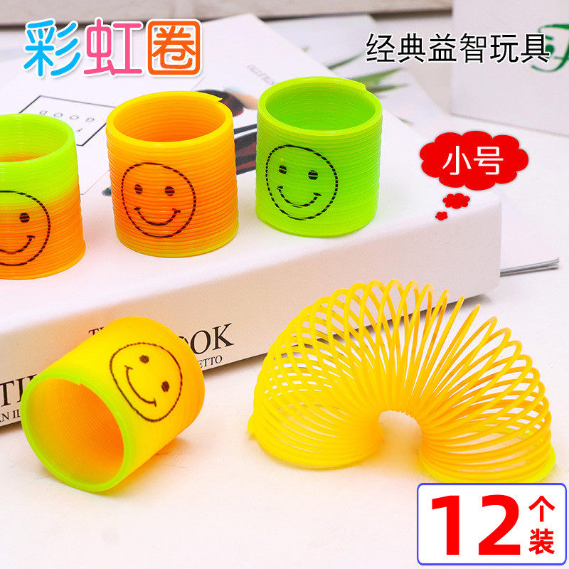 Colorful trumpet smiley face elastic rainbow circle magic spring rainbow tower creative children's educational toys stacking music