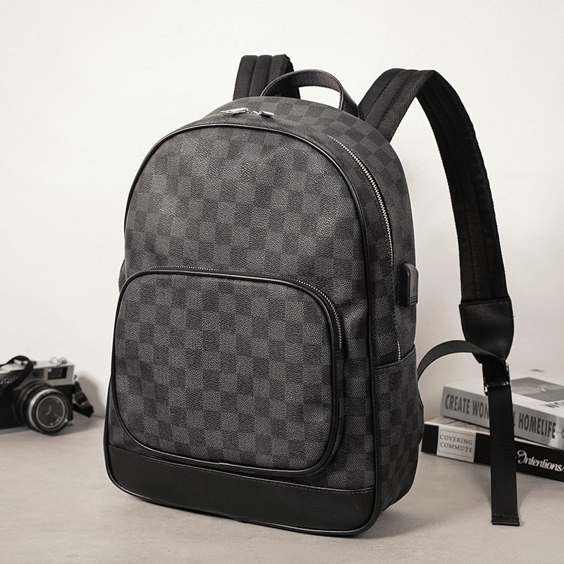 Hong Kong leather men's backpack trend backpack men's large-capacity European and American fashion backpack youth computer bag