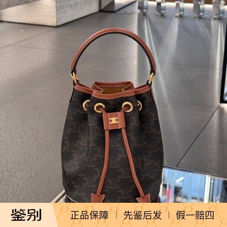 Celine Triomphe Canvas Monogram Drawstring Small Bucket Bag in Calfskin Crossbody Bag Celine Triomphe Canvas Monogram Drawstring Small Bucket Bag in Calfskin Crossbody Bag