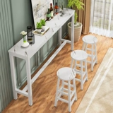 Заблокирован стеной, столом, домашним балконом, столом для чая с молоком и стулом комбинированного коммерческого длинного стола с высоким содержанием ноги с узким столом.