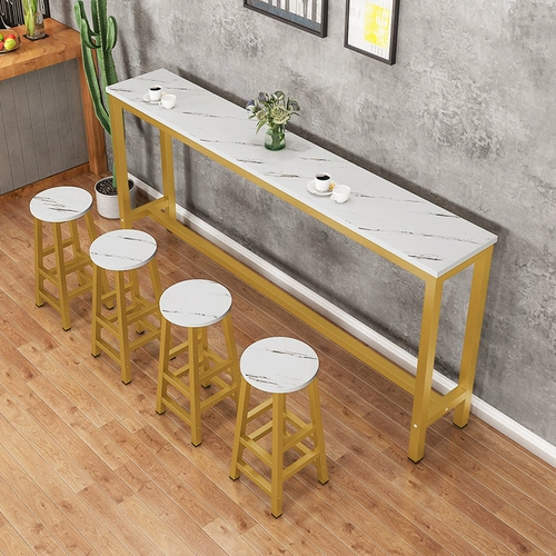 Заблокирован стеной, столом, домашним балконом, столом для чая с молоком и стулом комбинированного коммерческого длинного стола с высоким содержанием ноги с узким столом.