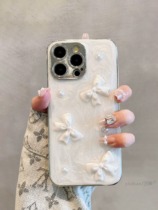 Suitable for Apple 14 15promax mobile phone case beautiful three-dimensional pearl bow iPhone 13 12 anti-fall