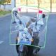 ລົດຈັກລົດໄຟຟ້າທາງຫນ້າ windshield ພາດສະຕິກ PC heightening and widening transparent windshield cover rain shield tricycle