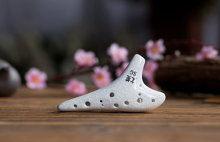 Người mới bắt đầu Ocarina 12 lỗ treble G / SG Ocarina 12 lỗ âm ỉ Sinh viên Ocarina gửi phụ kiện nhạc cụ - Nhạc cụ dân tộc