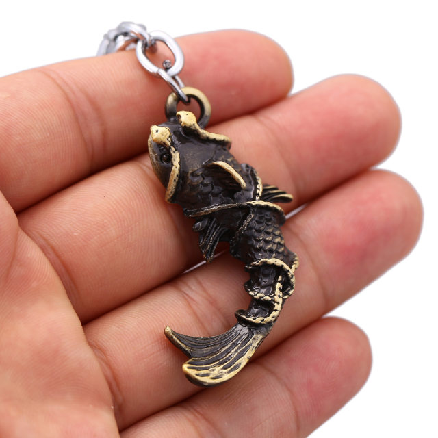 The new TombNote Tomb Raider Notes Surrounding Snake Eyebrow Copper Fish Zhang Qiling Wu Xie Keychain Pendant