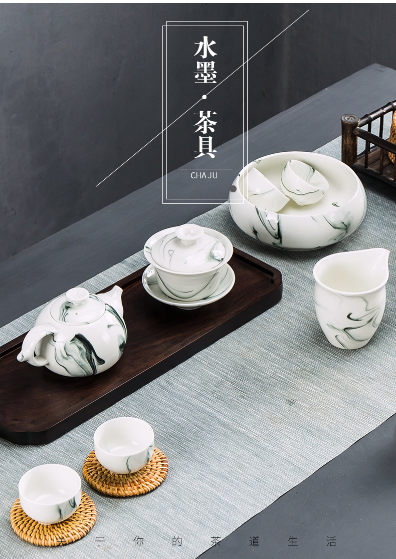 Building In hand - made kung fu tea set household contracted blue and white porcelain ceramic dehua white porcelain tea set. A complete set of tea cups