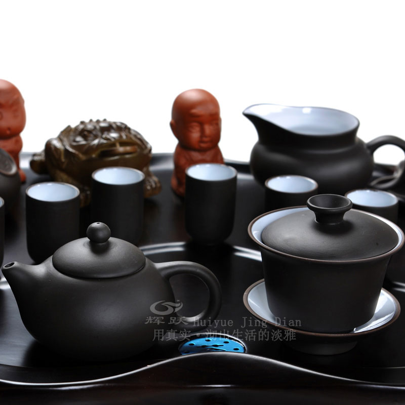 Hui make yixing purple sand of a complete set of kung fu tea set laughing Buddha maitreya wing real wood the tea tray