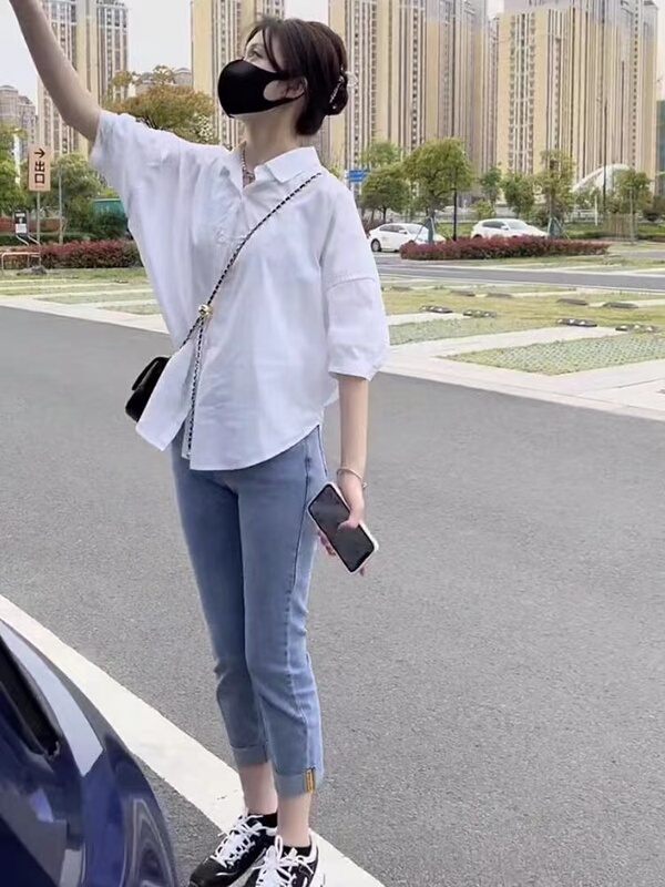 Mid-Sleeve White Shirt Casual Top Nine-Point Length Jeans Set for Women 2026 New Stylish and Trendy Two-Piece Summer Outfit Mid-Sleeve White Shirt Casual Top Nine-Point Length Jeans Set for Women 2026 New Stylish and Trendy Two-Piece Summer Outfit