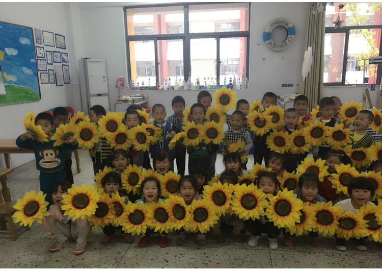 Mô phỏng hoa hướng dương ngày của trẻ em thực hiện hiệu suất đạo cụ nhảy múa tay cầm hoa hướng dương hoa giả trang trí phòng khách - Hoa nhân tạo / Cây / Trái cây cây giả trong nhà