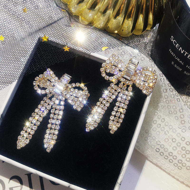 925 butterfly knot full drill runner earrings female Korean personality 100 hitch-style long version ear-pin name Ehime headwear net red