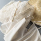 ການອອກແບບ niche beige see-through embroidery temperament short top ເສື້ອ lace high-end ຂອງແມ່ຍິງທີ່ມີ suspenders