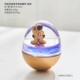 Космонавт, золотая неваляшка