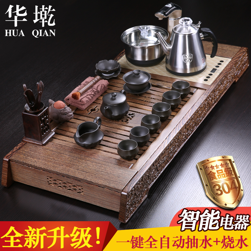 China Qian tea set chicken wings wood four unity induction cooker yixing purple sand tea tray was kung fu tea set automatic stone mill