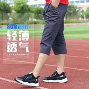 Quần short Jordan nam cắt quần mùa hè mới quần short nhanh khô thoáng khí quần rộng giản dị quần bó sát nam thẳng - Quần thể thao