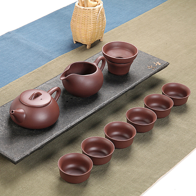 Xin yuan, yixing purple sand kung fu tea set and a half manual it undressed ore sea. A complete set of tea cups