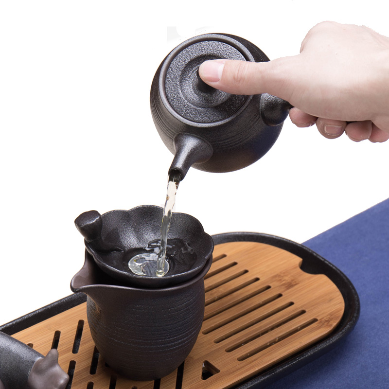 Xin arts edge creative household ceramic teapot Japanese kung fu tea tea is the pot of single pot large black pottery side