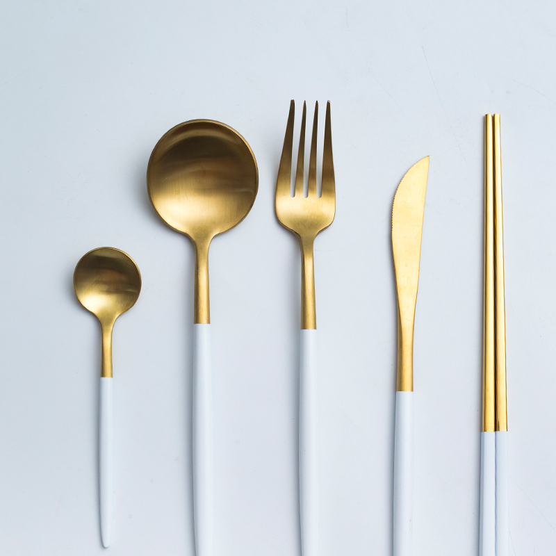 Black and white and gold and silver wire drawing of stainless steel tableware suit beefsteak coffee spoon dinner knife and fork spoon, chopsticks combination