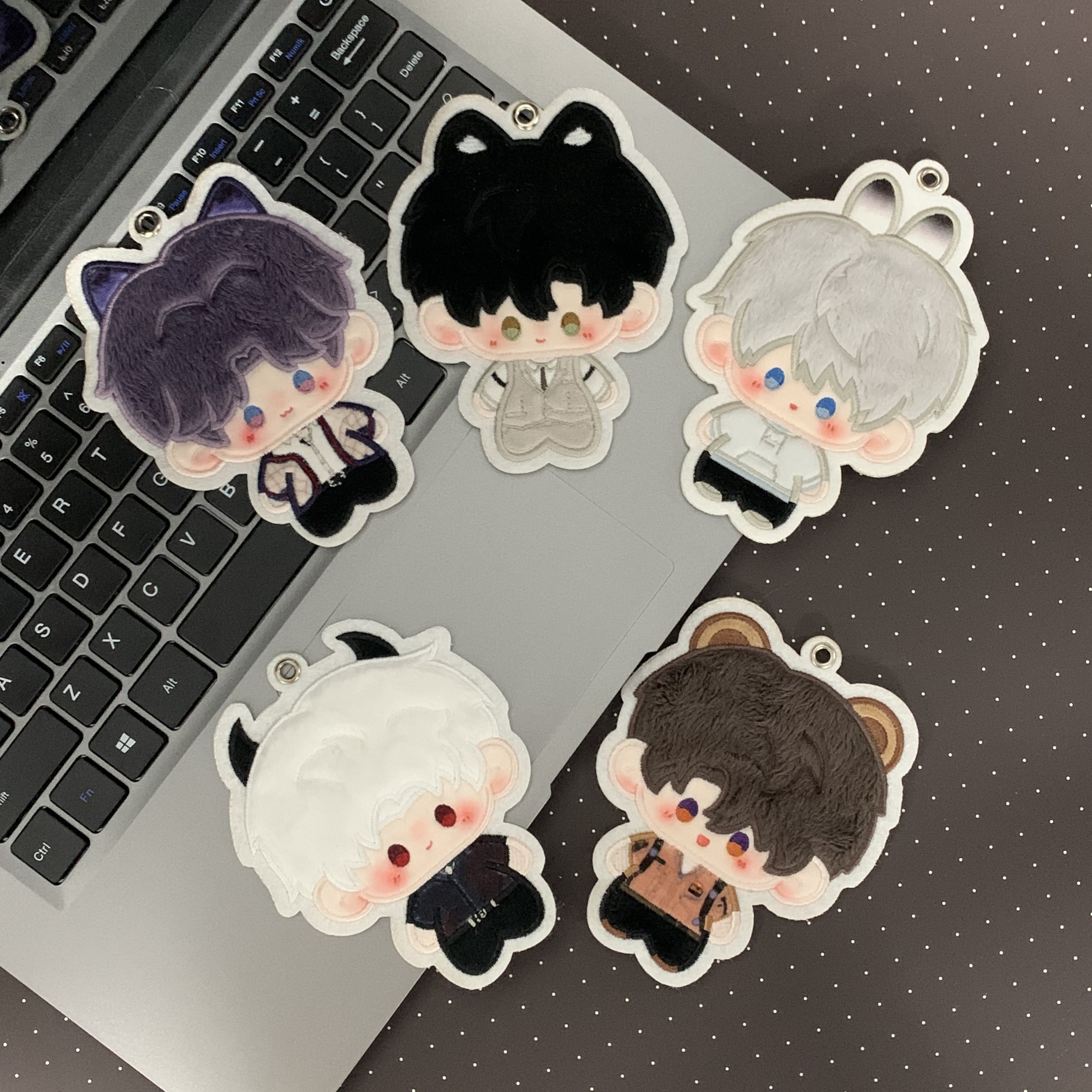 Love and Deepspace character plush charms with embroidered outfits