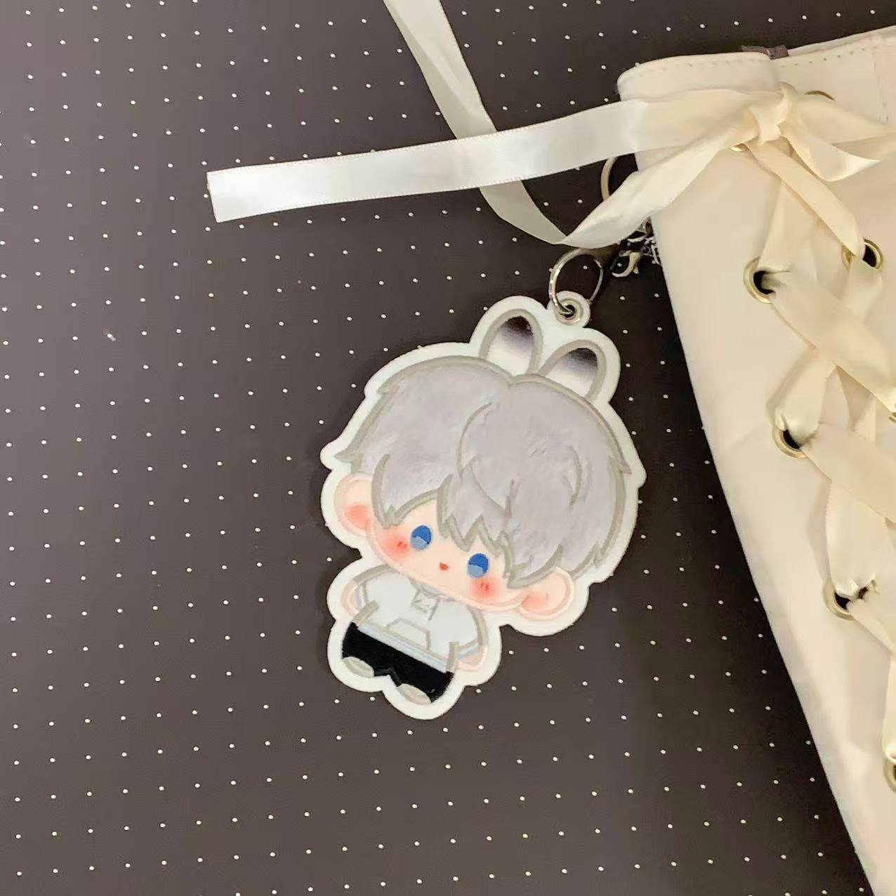 Fan-made Xavier embroidered plush charm attached to a bag
