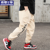 Boys pants 2021 new spring and autumn Korean version of trousers in the big childrens spring boys casual pants loose overalls tide