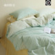 Her bedroom has a fresh spring and autumn mint green striped wash cotton cotton sheets and quilt covers bed four-piece set