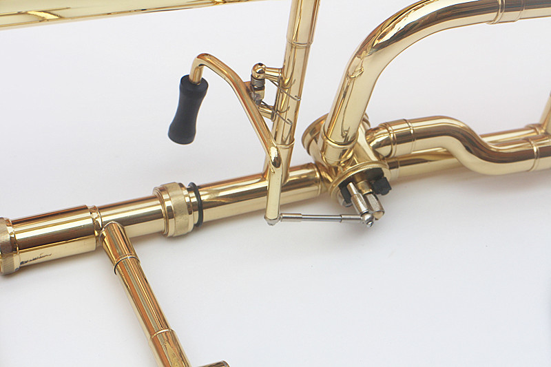 Tenor trombone B phẳng bằng đồng sơn mài vàng trombone điều chỉnh trombone one 奇 nhạc cụ phương Tây chuyên nghiệp đàn guitar mini