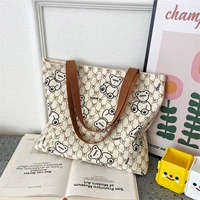 Бежевый плюшевый мишка