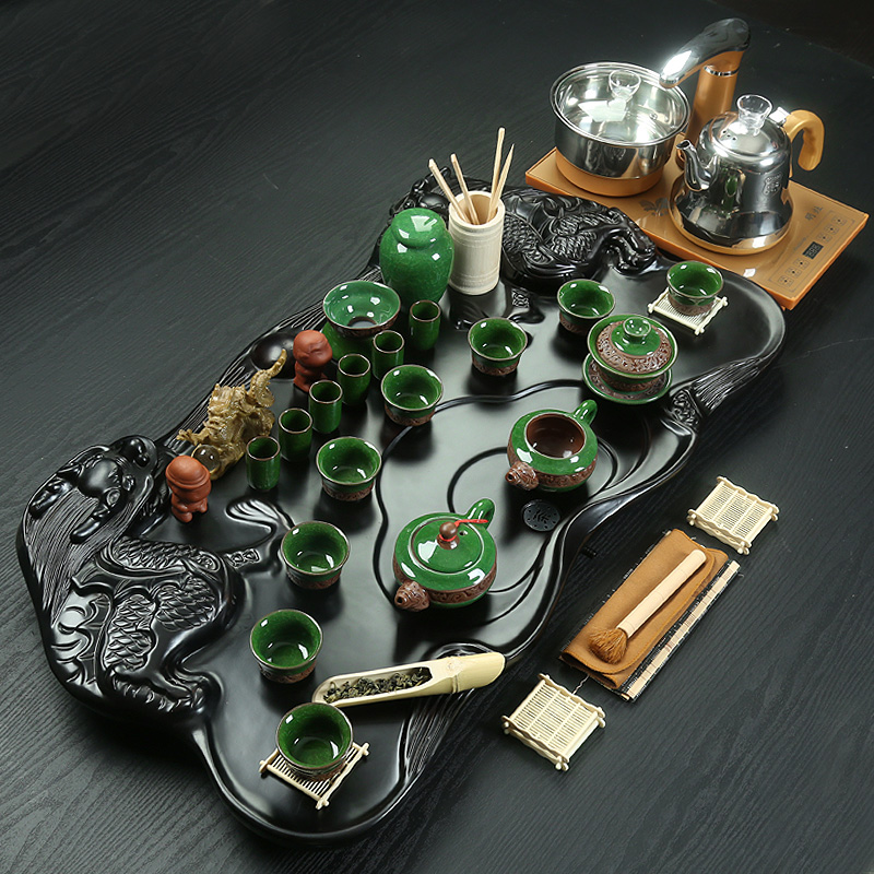 Porcelain heng tong tea cups suit household contracted purple sand pottery and Porcelain of a complete set of kung fu tea set automatic tea tea tray