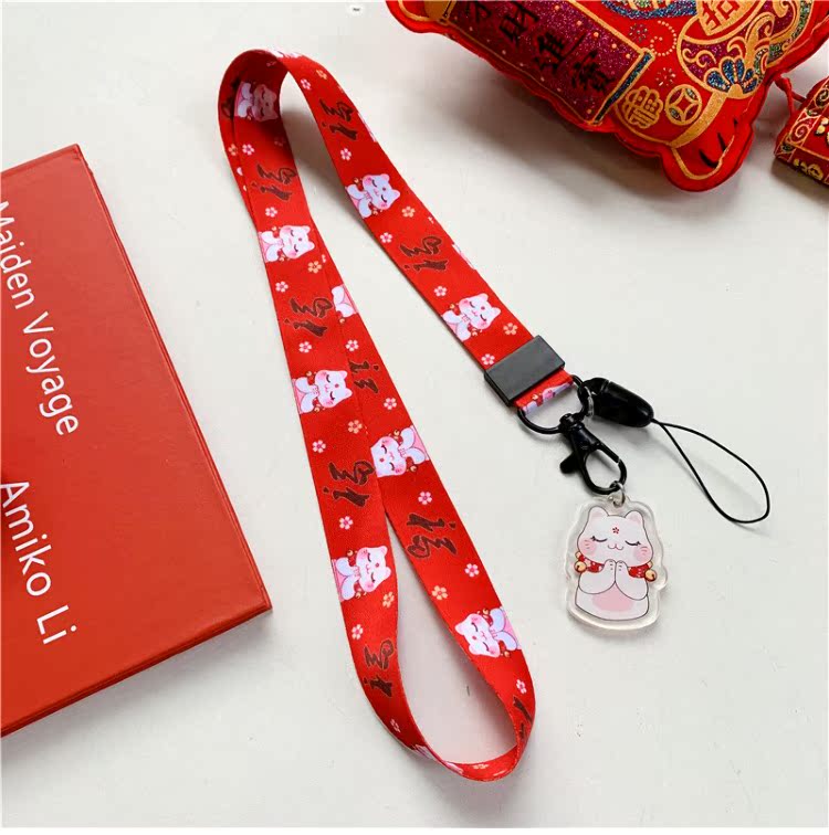 New Year Lucky Cat điện thoại dây buộc dây băng thông rộng nữ sáng tạo chủ chốt mặt dây chuyền chuỗi sling chiều dài phim hoạt hình màu đỏ chống mất - Phụ kiện điện thoại di động ốp lưng samsung j2