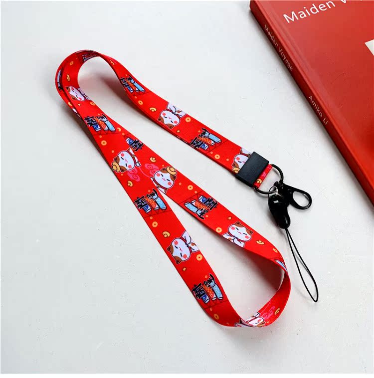 New Year Lucky Cat điện thoại dây buộc dây băng thông rộng nữ sáng tạo chủ chốt mặt dây chuyền chuỗi sling chiều dài phim hoạt hình màu đỏ chống mất - Phụ kiện điện thoại di động ốp lưng samsung j2