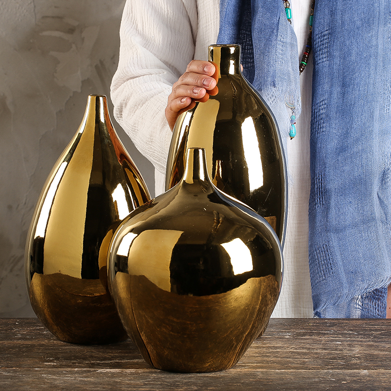 Large number of golden ceramic vases European-style minimalist modern table face floral parlor decorated with rich and expensive bamboo flower arrangement pendulum