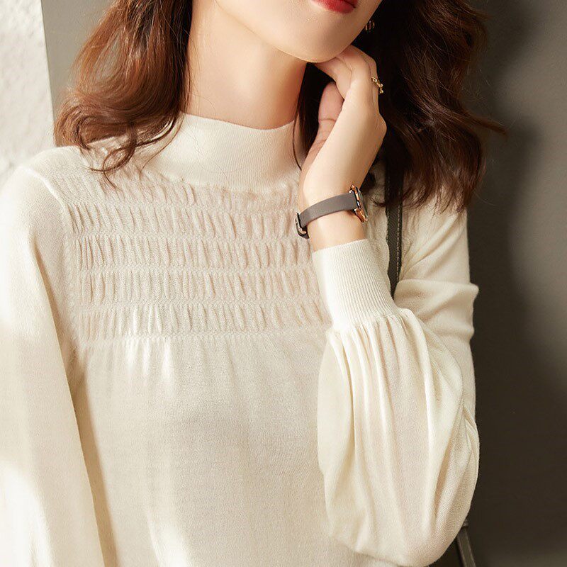 Lantern sleeve wool bottoming top women's 2022 autumn and winter new Korean version fashion light luxury half turtleneck pleated sweater