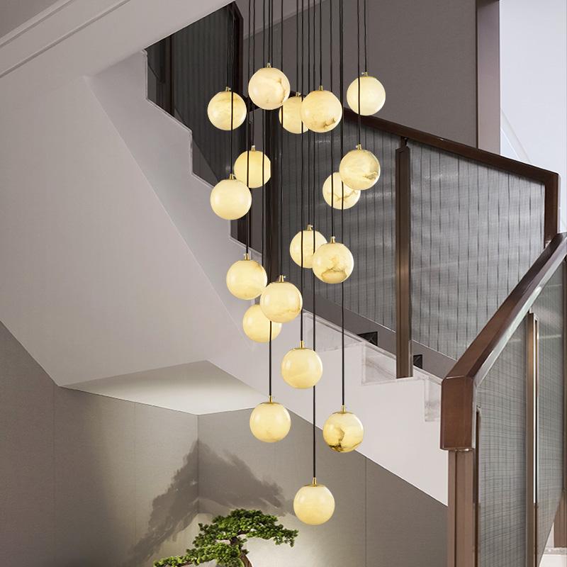 Duplex stair lamp cloud stone long chandelier new Chinese simple rotating stairwell lamp Nordic jump-storey villa full copper lamp